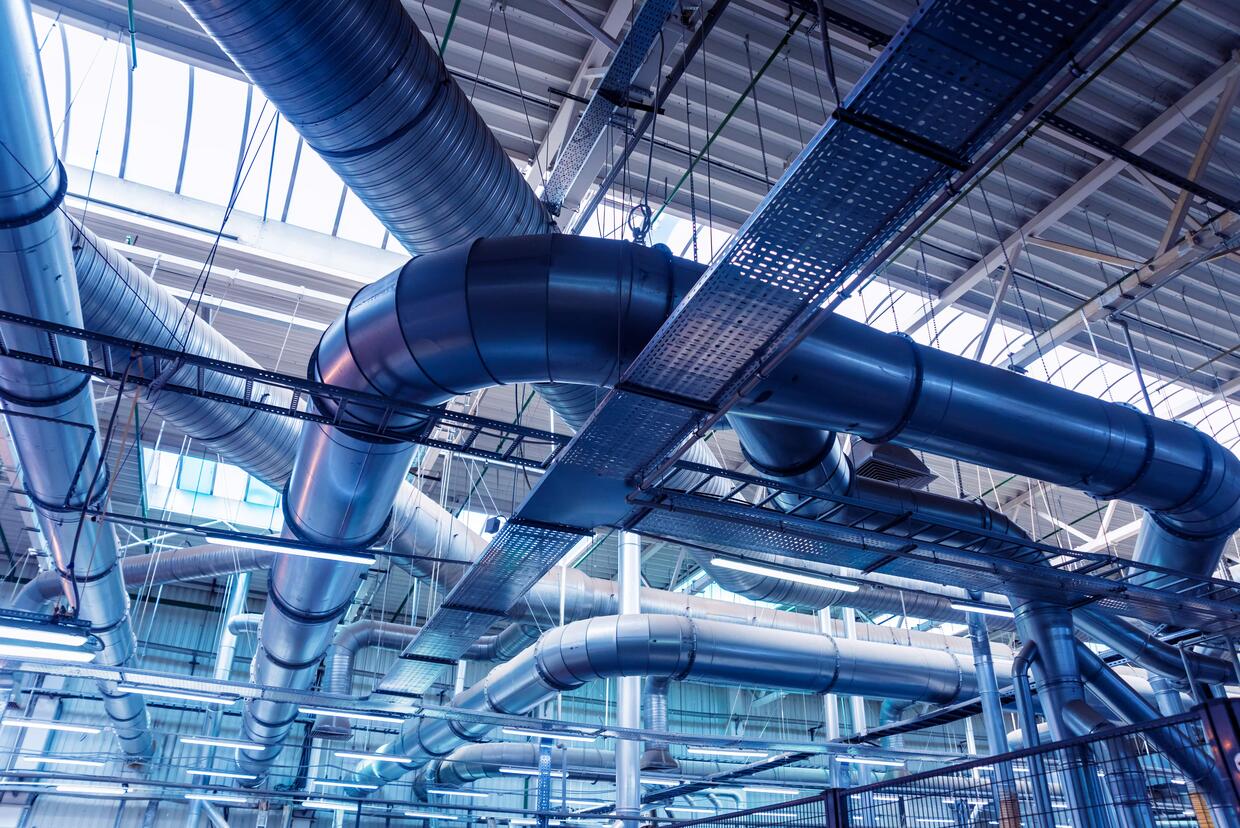 AIR CONDITIONING OF BUILDINGS. BACKGROUND OF VENTILATION PIPES. LAYING OF ENGINEERING NETWORKS.